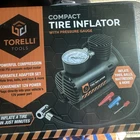 Torelli Compact Tire Inflator With Pressure Gauge. 12 Volt Power. New Box. Price: $22.00.