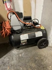 Campbell Hausfeld Portable Wheeled Electric Air Compressor Tank Hose Black Used. Price: $100.00.