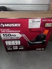 Husky 8 Gal. 150 Psi Portable Electric Oil-free Air Compressor W/ Rubber Wheels New. Price: $170.00.