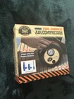 Dirty Dog Garage Tire-shaped Air Compressor 250 Psi, Portable Travel 12V Plug-in Open. Price: $25.00.