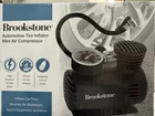 Brookstone Mini Air Compressor Automotive Tire Inflator 12V Dc 300PSI New/sealed. Price: $30.00.