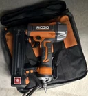 Ridgid 18 Gauge Pneumatic Brad Nailer Air Tool W/ Carry Bag Orange/black Seller. Price: $117.00.