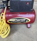 Coleman Powermate VP201 Air Compressor W/ Yellow Coiled Hose Used. Price: $70.00.