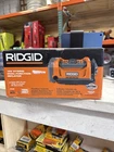 Ridgid 18V Cordless Inflator (tool Only) W/ Valve Adaptor, Needle & Nozzles Open. Price: $70.00.