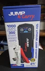 New Jump-n-carry 12 Volt 1000 / 300 Amp Portable Lithium Starter JNC305 Nib. Price: $55.00.
