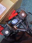Amazon Basics - Portable Digital Air Compressor, Dual Battery Clamps New. Price: $39.88.