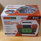 Stop & Go Heavy Duty Portable 12 Volt Dual Piston Tire Inflator Air Compressor New. Price: $125.00.
