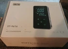Touchscreen Digital Inflator Pump Portable Mini Air Compressor For Car Suitu Nib Open. Price: $9.95.