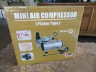 Brand New Sealed Professional Airbrush Kit, Compressor Rohs Model No. TC-20. Price: $134.99.