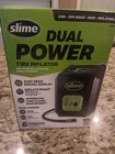 Slime Dual Power Tire Inflator #40052 New. Price: $32.00.