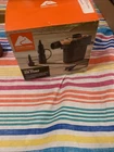 Ozark Trail 120V Ac Plug Electric Air Pump, Grey And Orange New Open Box. Price: $9.66.