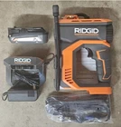 Ridgid 18V Cordless Portable Inflator Kit With 2.0 Ah Battery And Charger Open. Price: $119.99.
