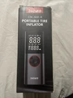 Zgzuxo Portable Tire Inflator With Digital Display Model CZK-3691-R New. Price: $29.99.