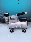 Central Pneumatic S34843 Mini Compressor 1/8HP Model Airbrushing War Hammer Used. Price: $69.95.