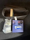Gm 13392074 12V Portable Tire Inflator Air Compressor Kit Blue W/ Case & Hose New. Price: $40.00.