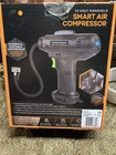 Smartgear - 12 Volt Handheld Air Tire Compressor New Sealed. Price: $38.00.