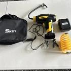 Skey Car Air Pump Black With Yellow Trim Case And All Accessories Original Box Used. Price: $38.00.
