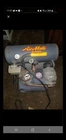 Air Mate Emglo Compressor 4 Gallon Electric Hand Carry. (without Hose) Used. Price: $75.00.