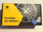 Z-edge ZA102 Portable Air Inflator 150 Psi Battery Works Great Open. Price: $23.99.