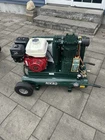 Nikro 8422HK30HP-0052 Portable Gasoline Air Compressor, 175 Psi, Green New. Price: $2250.00.